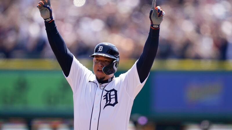 Detroit Tigers designated hitter Miguel Cabrera reacts on first base after his 3,000th career...