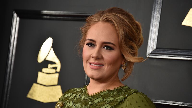 FILE - In this Feb. 12, 2017, file photo, Adele arrives at the 59th annual Grammy Awards at...