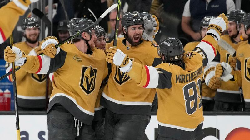 Vegas Golden Knights defenseman Nicolas Hague (14) celebrates after scoring against the...