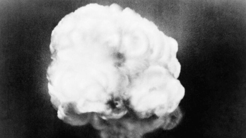 FILE - This July 16, 1945, file photo, shows the mushroom cloud of the first atomic explosion...