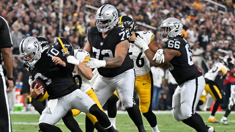 Las Vegas Raiders quarterback Jimmy Garoppolo (10) is sacked by Pittsburgh Steelers linebacker...