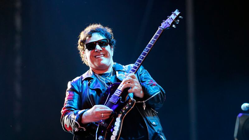 Neal Schon of the band Journey performs on day three of the Lollapalooza music festival on...