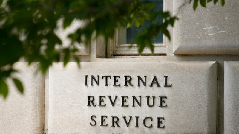 FILE - A sign outside the Internal Revenue Service building in Washington, on May 4, 2021. The...