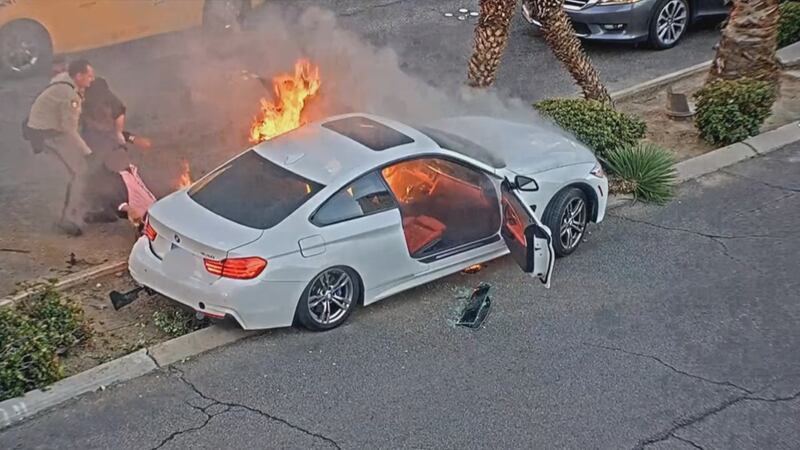 Officer, driver hospitalized after fiery crash on Las Vegas Strip