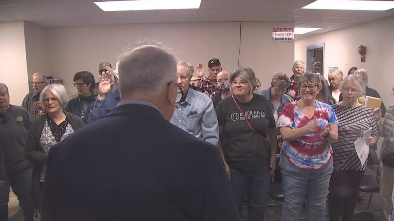 Nye County volunteers are sworn in on Oct. 26, 2022 ahead of a hand count of mail-in ballots.