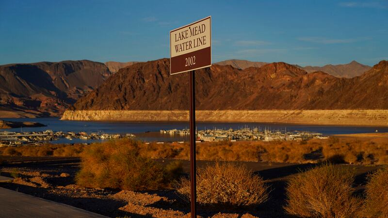 A sign marks the water line from 2002 near Lake Mead at the Lake Mead National Recreation...