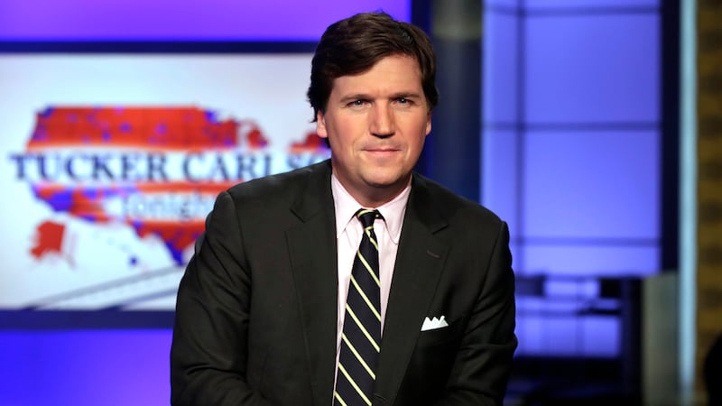 In this March 2, 2017 file photo, Tucker Carlson, host of "Tucker Carlson Tonight," poses for...