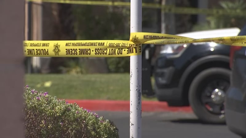 Crime scene tape is seen with Las Vegas police vehicles in this FOX5 file photo