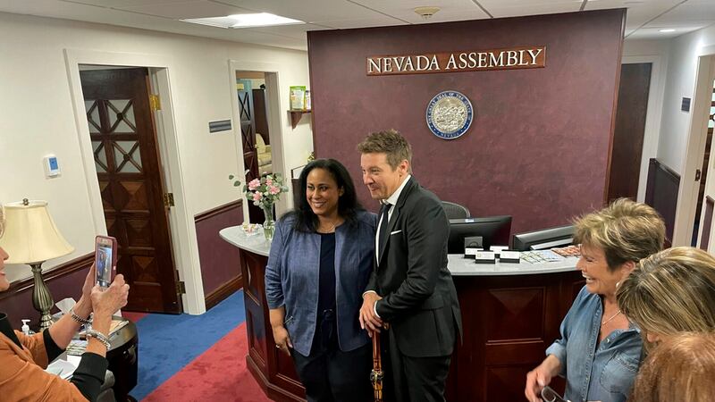Actor Jeremy Renner poses for a photo with Democratic Assemblywoman Brittney Miller in Carson...