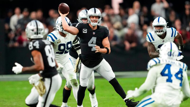 Las Vegas Raiders quarterback Derek Carr (4) throws against the Indianapolis Colts during an...