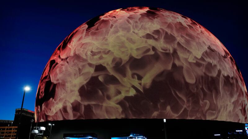 Members of the media wait for celebrities to arrive during the opening night of the Sphere,...