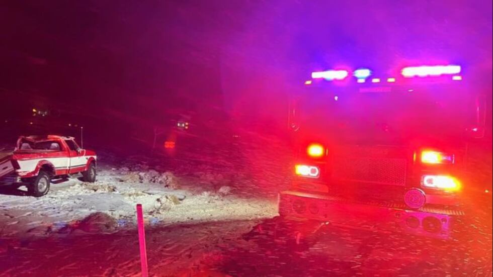 First responders on the scene of the rollover crash near I-95 and Lee Canyon