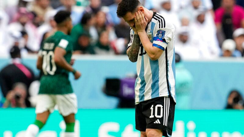 Argentina's Lionel Messi reacts disappointed during the World Cup group C soccer match between...